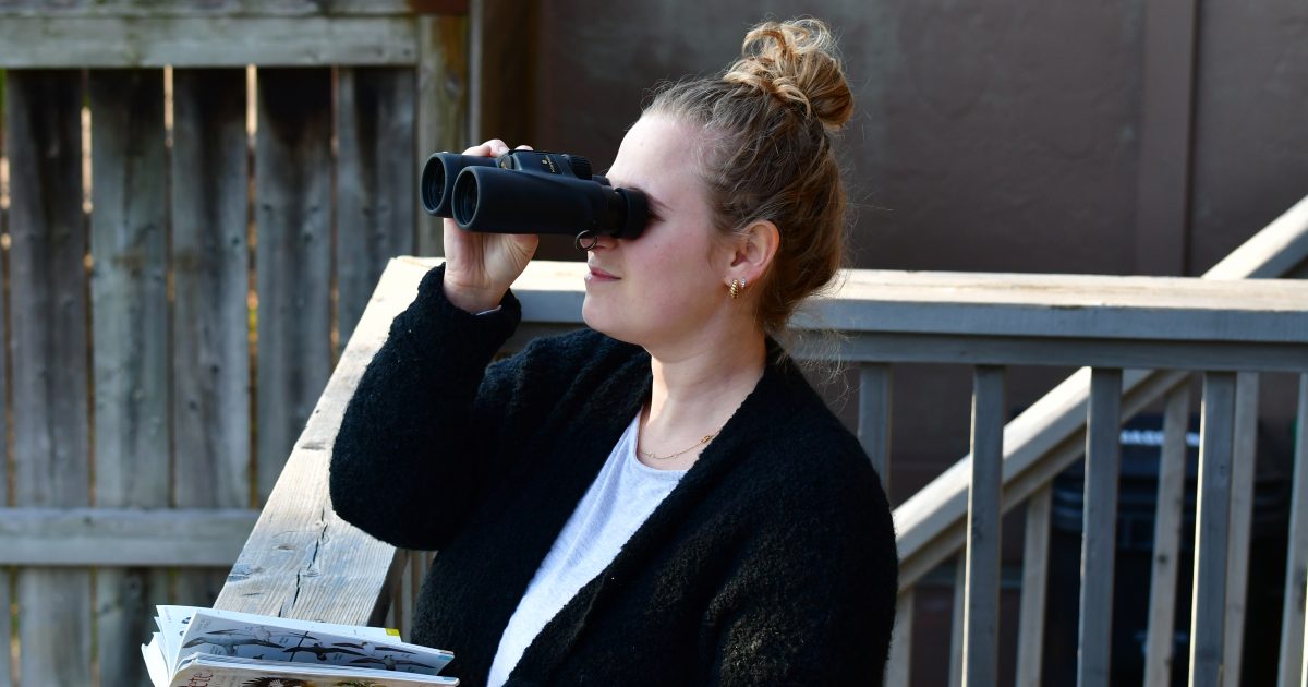 Person using binoculars