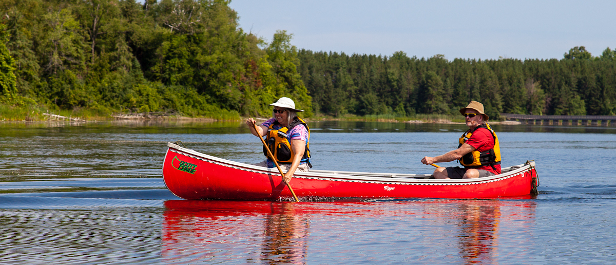 Couple canoeing on Island Lake