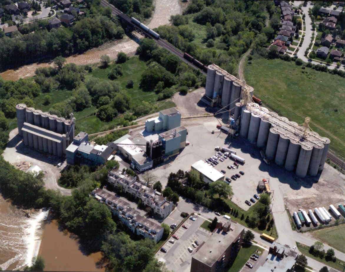 Aerial photo of a mill facilitynext to river